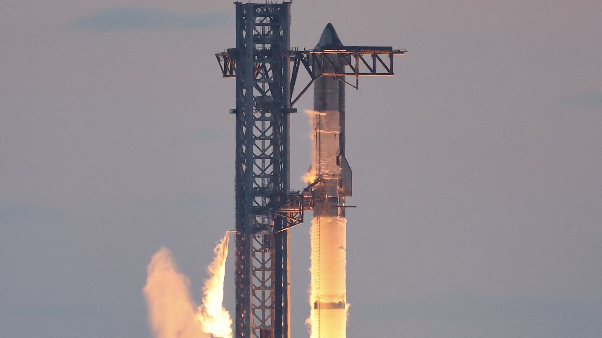 Starship and Super Heavy igniting on Integrated Flight Test 5 at Starbase, 13 October 2024